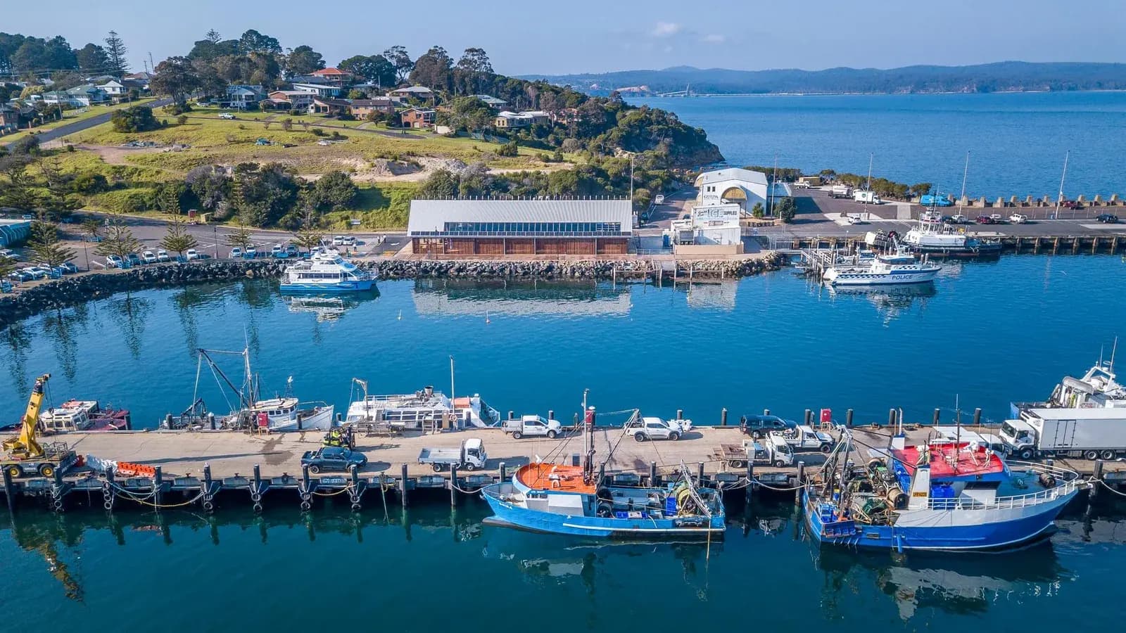 Aerial view of Eden Welcome Centre and vessels on the water